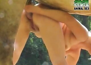 Gorgeous blonde is stuffing mouth with a giant horse shaft