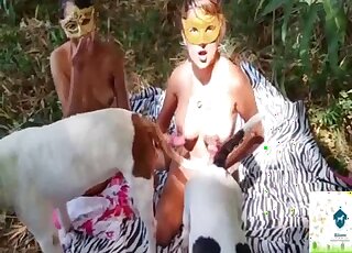 Latina babes are having outdoor zoo foursome with endowed dogs