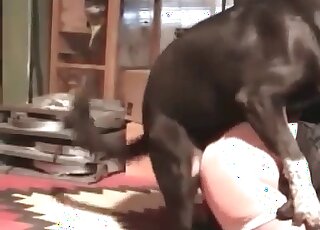 Mature gets fisted before enjoying her dog’s huge dick in her hole