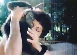 Attractive brunette gives a small-dicked ape a nice blowjob outdoors
